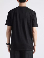 Black cotton t-shirt with relaxed fit and crew neck, shown from the back.