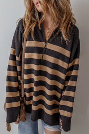 Oversized black and tan stripe knit pullover with half-zip neckline.