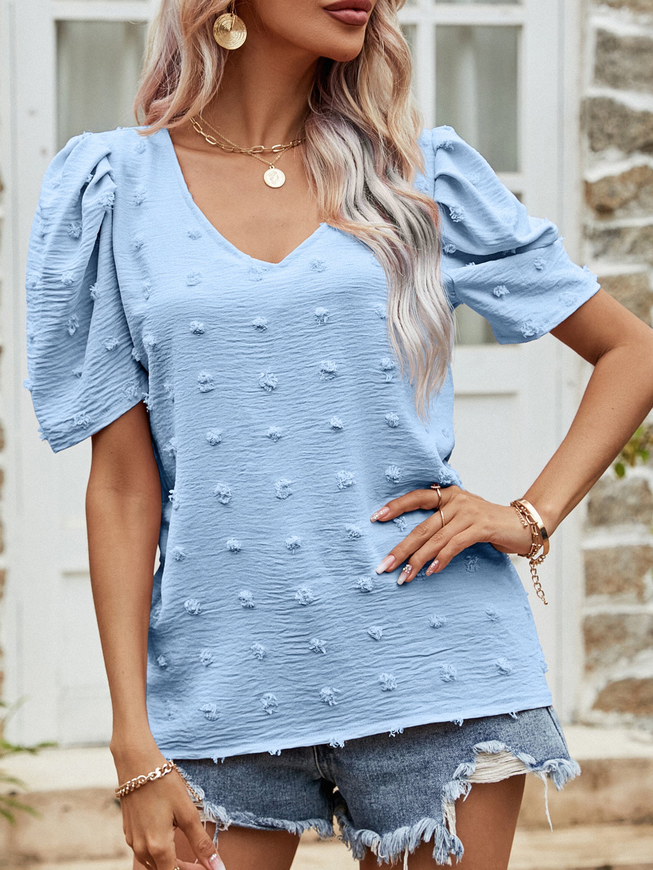 Blue textured dotty puff sleeve blouse with V-neck