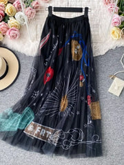Black tulle midi skirt with whimsical sunburst and abstract print