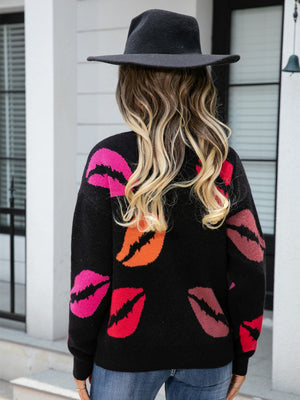 Black V-neck knit pullover with colorful kiss print, acrylic material.