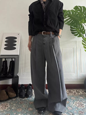 Men's gray pinstripe wide-leg pants with high waist and button fly.