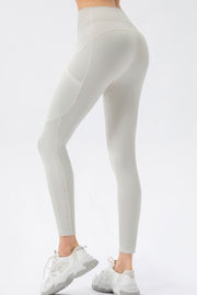 Light gray mesh pocket performance leggings with contrast stitching.