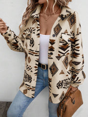 Tan Aztec print sherpa shacket with button front and chest pockets.