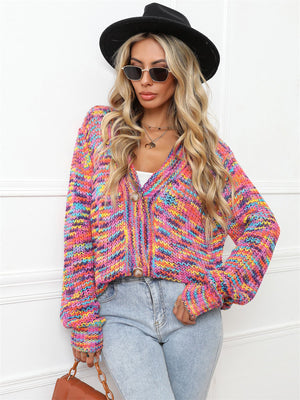 Prismatic knit button-down cardigan with multicolor stripes and a V-neck.