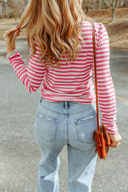 Ribbed striped long sleeve turtleneck in pink and white, slim fit.