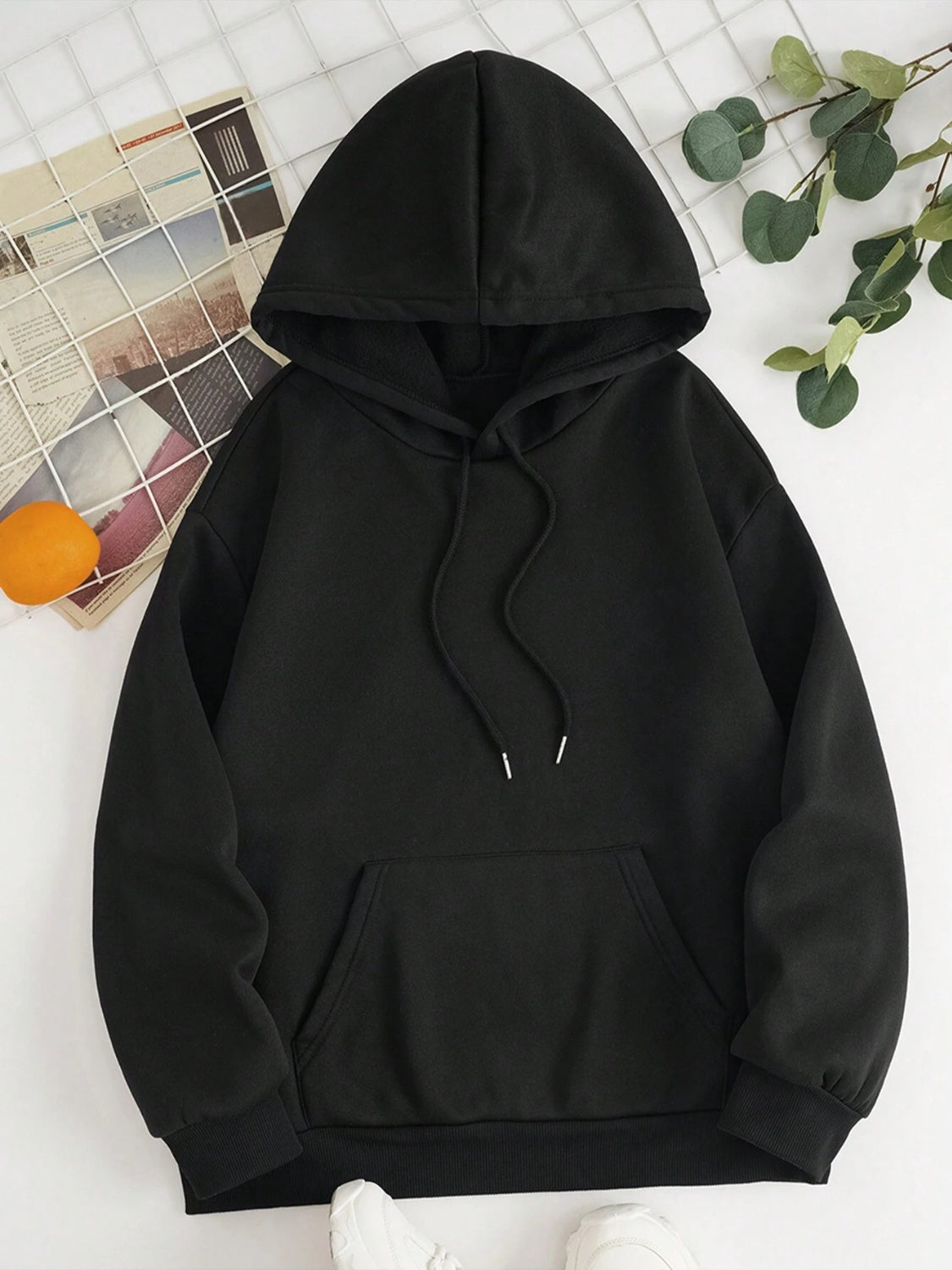 Black oversized hoodie with pouch pocket and drawstring hood