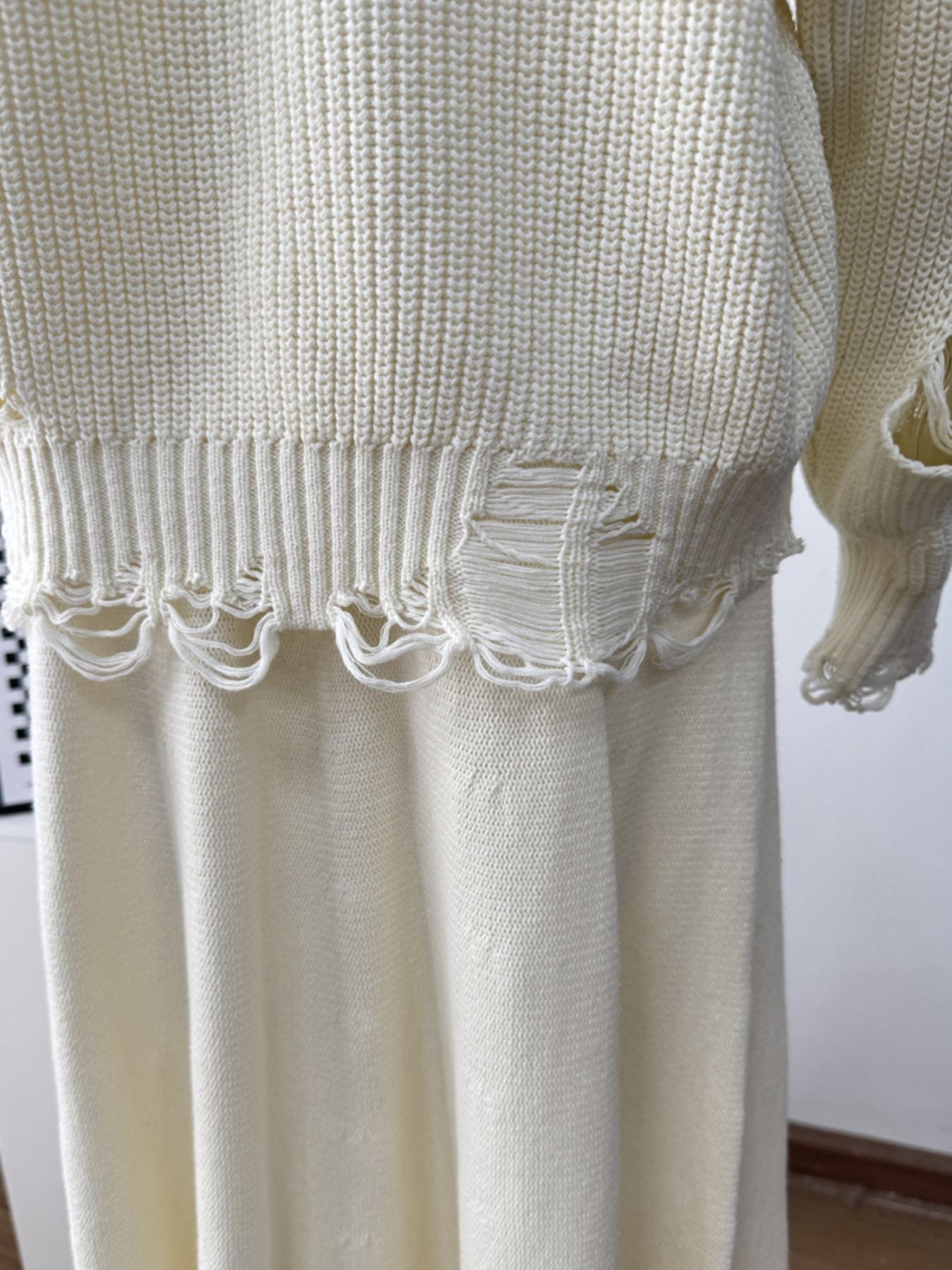 Off white distressed cotton sweater set with deconstructed hem detail