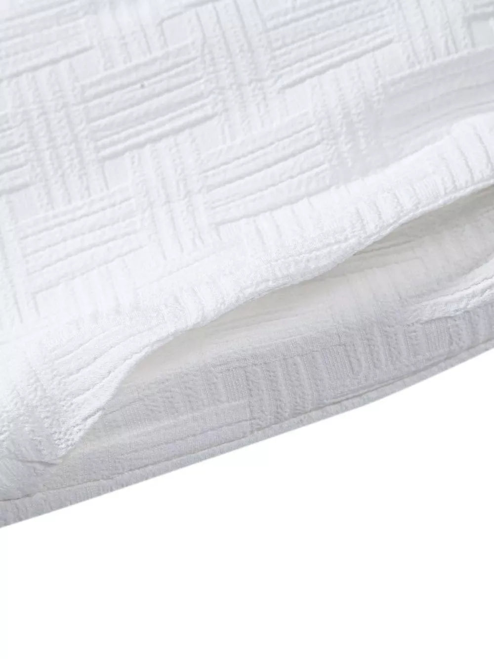 Men's Textured Drawstring Shorts in White, model styling view