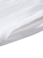 Men's Textured Drawstring Shorts in White, model styling view