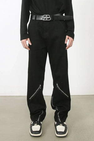 Zipped hem black denim trousers with a casual, chic style.
