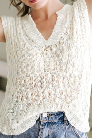 Beige textured knit V-neck shell top with a relaxed fit.