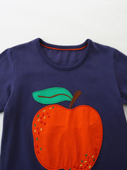 Navy toddler t-shirt with orange apple appliqué and green leaf detail.