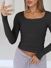 Black long sleeve slim-fit t-shirt with square neckline, cropped length
