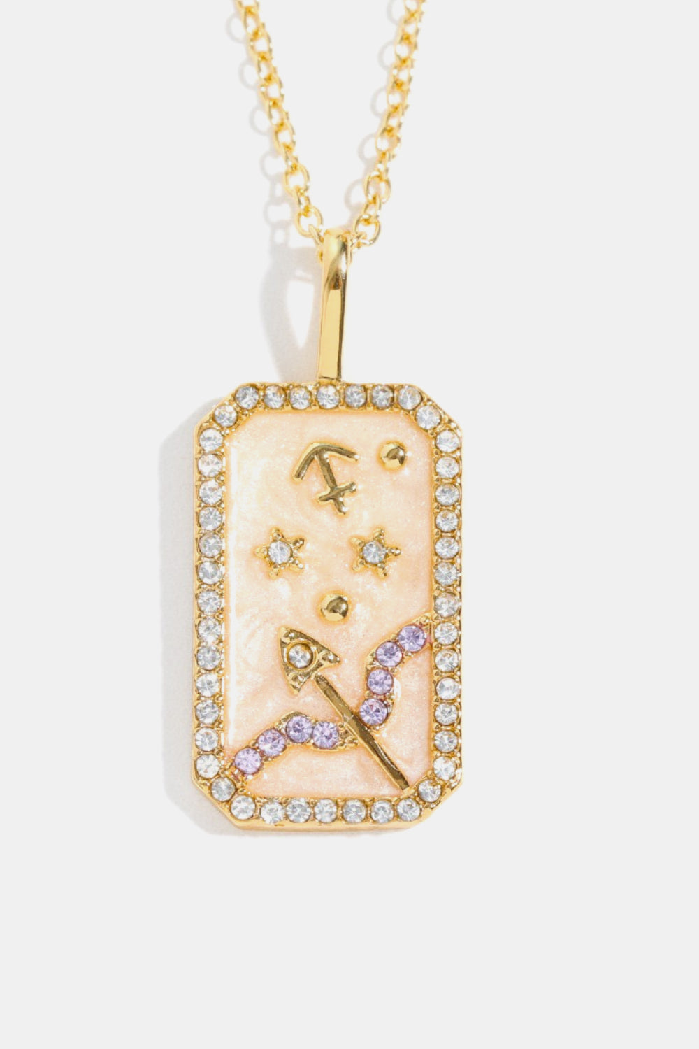 14K gold-plated Sagittarius zodiac sign crystal pendant necklace with pink enamel and rhinestones.