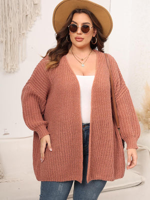 Chunky knit cardigan in coral with balloon sleeves and open front.