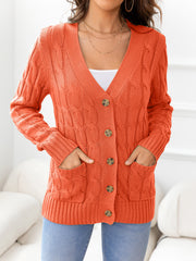 Orange cable-knit cardigan with V-neck, buttons, and pockets.
