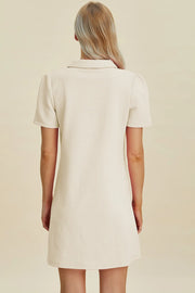 Ivory textured short sleeve mini dress with geometric pattern and collar