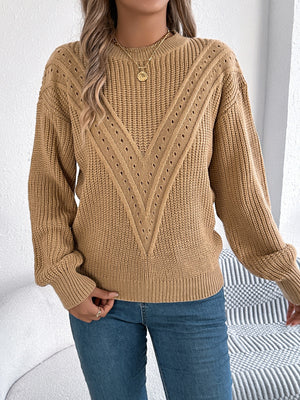 Camel chevron knit sweater with eyelet detail and crew neck.