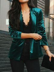 Deep Teal velvet blazer with black trim, open front, and notched lapels.