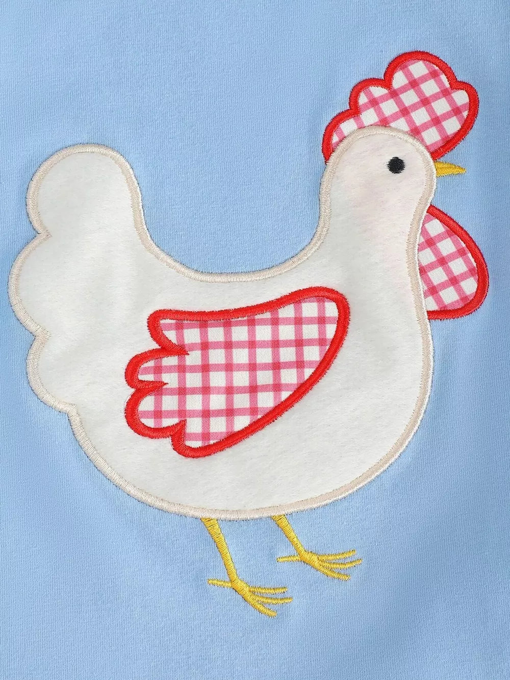 Baby set with a white chicken appliqué featuring pink gingham wings and comb on light blue fabric.