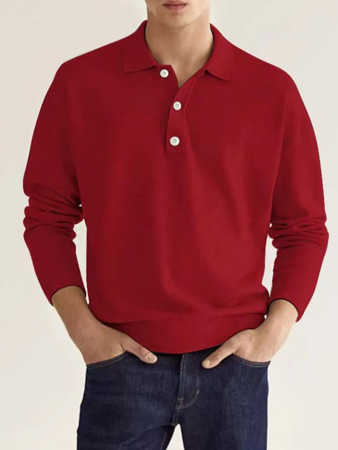 Relaxed long sleeve polo knit shirt in Scarlet with buttoned placket and ribbed cuffs.