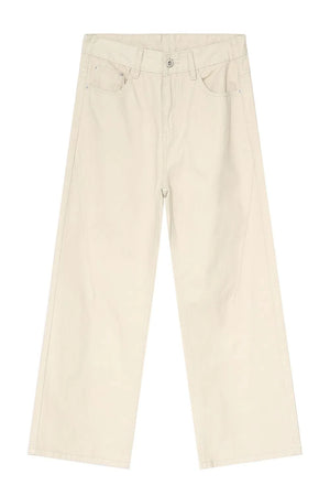 Wide-leg cream denim jeans with angular seams and a casual fit.