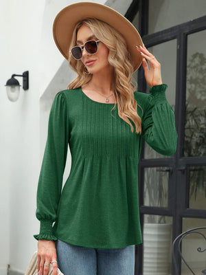 Green pleated bodice gathered sleeve top with smocked cuffs