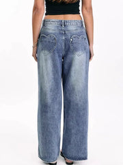 Wide-leg denim jeans with heart-shaped back pockets and a light wash.