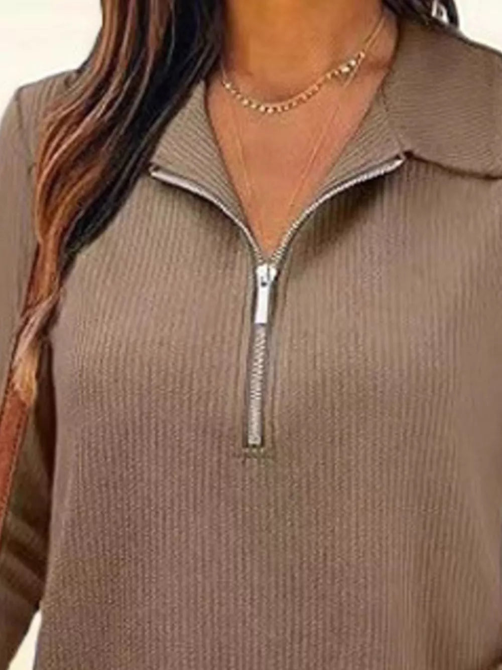 Ribbed knit half-zip top in Khaki with a silver zipper detail.