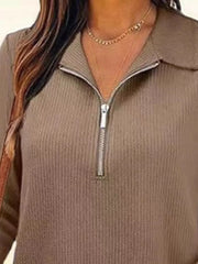 Ribbed knit half-zip top in Khaki with a silver zipper detail.