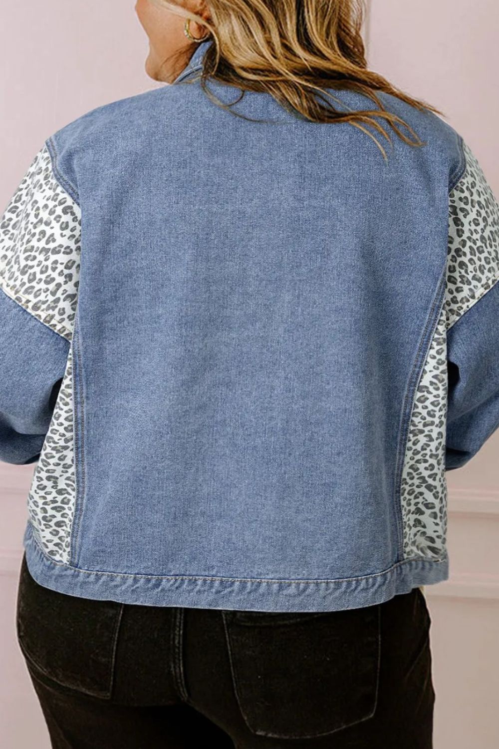 Denim oversized jacket with leopard print panels on sleeves and sides.