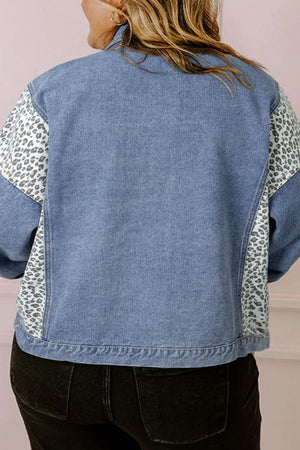 Denim oversized jacket with leopard print panels on sleeves and sides.