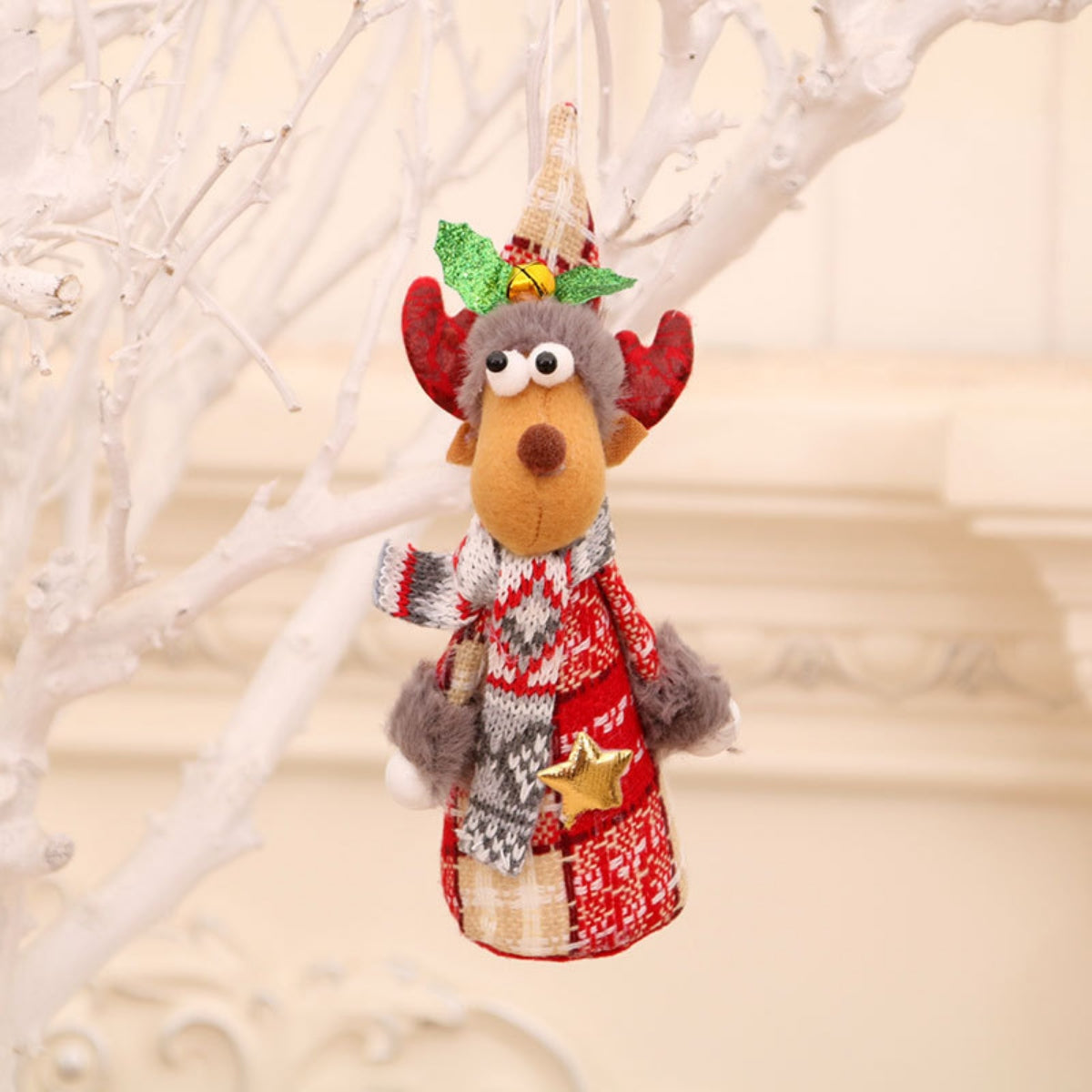 Plush reindeer ornament with red, white, and gray plaid pattern, scarf, and hat.