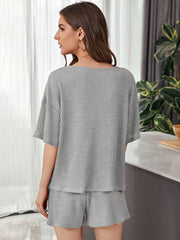 Relaxed waffle knit henley short set in dark gray, featuring a relaxed fit top and shorts.