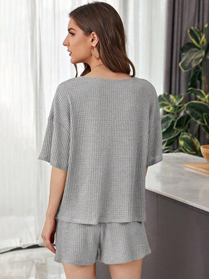 Relaxed waffle knit henley short set in dark gray, featuring a relaxed fit top and shorts.