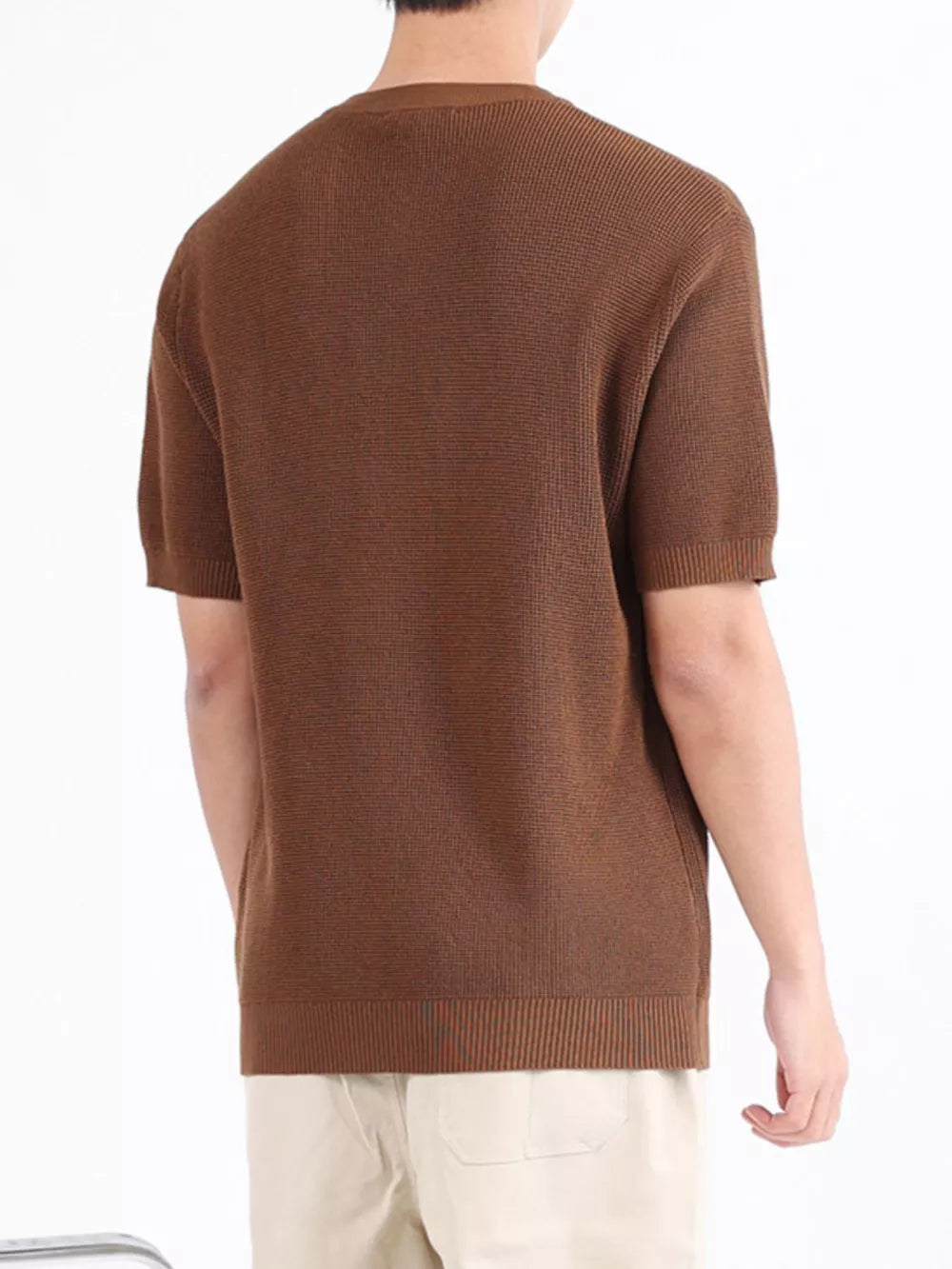 Brown textured knit henley shirt with short sleeves and ribbed hem.