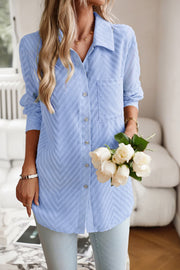 Light Blue Textured Chevron Button-Down Blouse with pocket detail