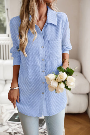 Light Blue Textured Chevron Button-Down Blouse with pocket detail