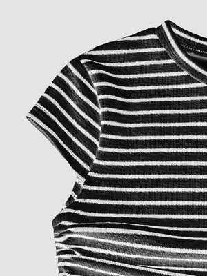 Black and white striped crop top with crew neck and short sleeves.