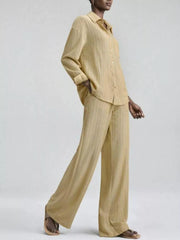 Chic striped two-piece set with button-down shirt and wide-leg pants in tan.