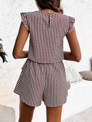 Burgundy and white patterned co-ord set with ruffle sleeves and shorts.