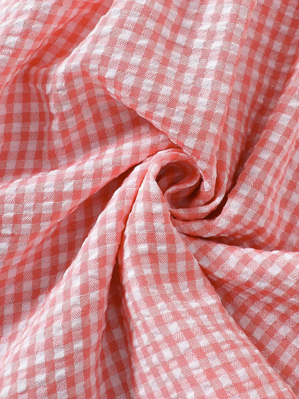 Children's Smocked Plaid Ruffle Sleeve Dress in Pink, back view