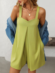 Pleated bodice pocketed romper in lime, featuring a casual one-piece design.