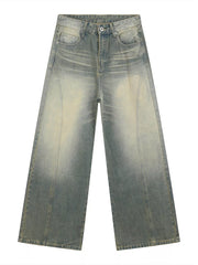 Timeless wide leg denim trousers in light blue wash with faded details and a relaxed fit.