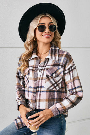 Soft plaid overshirt in blush pink with button front and patch pockets.