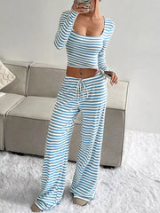 Blue and white striped two-piece set with crop top and drawstring pants