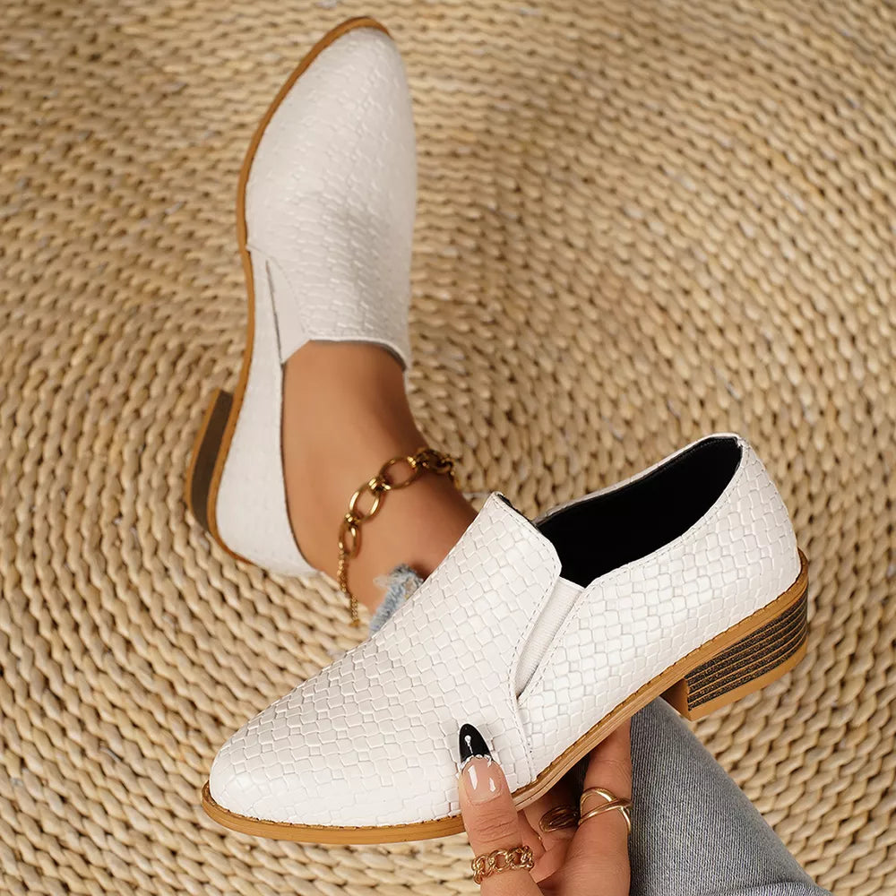 White woven texture pointed loafers with block heels and side elastic gore.
