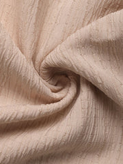 Tan textured cargo pants fabric detail