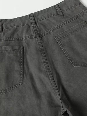 Grey cargo pants with buckle detail and pockets, showing back view and stitching.